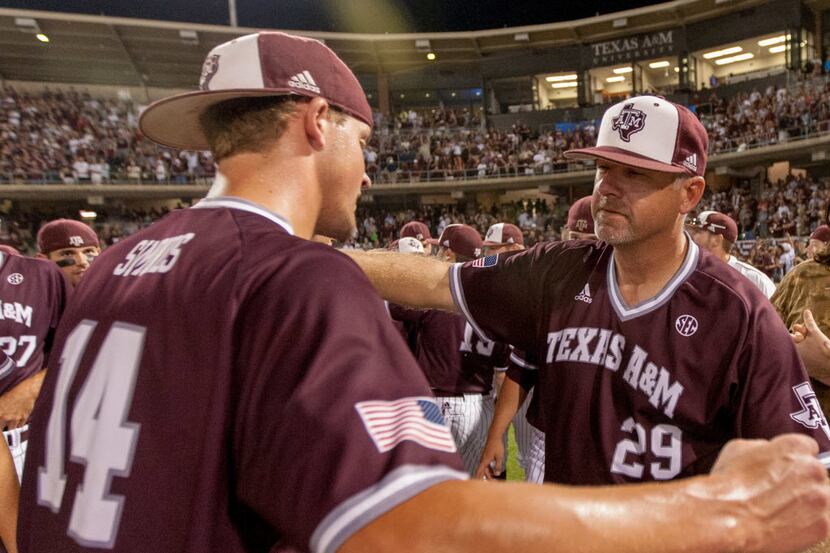 File - In this June 1, 2015 file photo, Texas A&M head coach Rob Childress (29) celebrates...