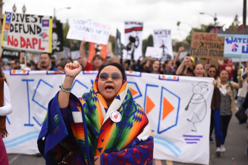 Protesters rally against the Dakota Access Pipeline during the 128th Rose Parade in...