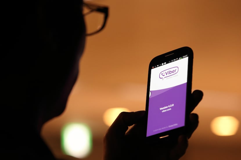 The Viber Internet messaging and calling service application is displayed on a smartphone in...