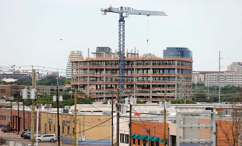 Quadrant Investment Properties' office building under construction at 1333 Oak Lawn Avenue...