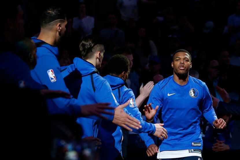 Dallas Mavericks guard Dennis Smith Jr. (1) is introduced before a game against the Detroit...