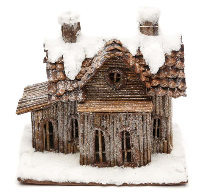 Snowed in: Miniature cabins crafted of organic elements, including twigs and pine cones, are...