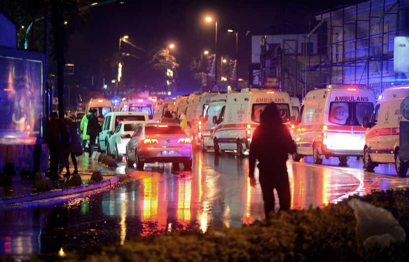 Medics and security officials worked at the scene after an attack at a popular nightclub in...