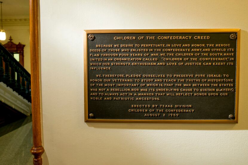 A plaque that some have targeted for removal from the State Capitol in Austin bears the...