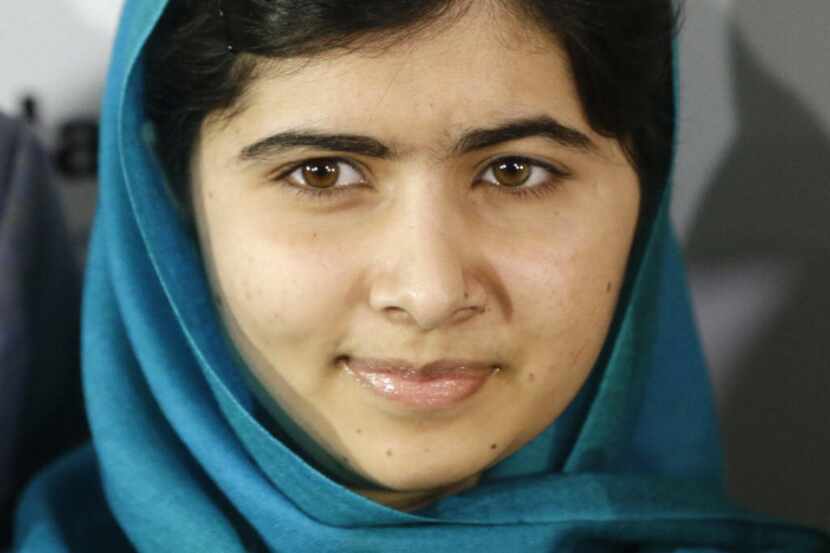 Malala Yousafzai poses for photographs on Thursday, Oct. 10, 2013, in New York. Yousafzai,...