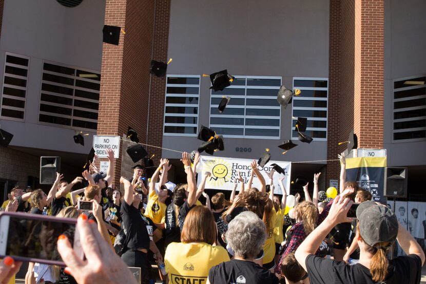 Cap toss at last year's Honor Connor 5K. Shane Buechele started the race by getting on stage...