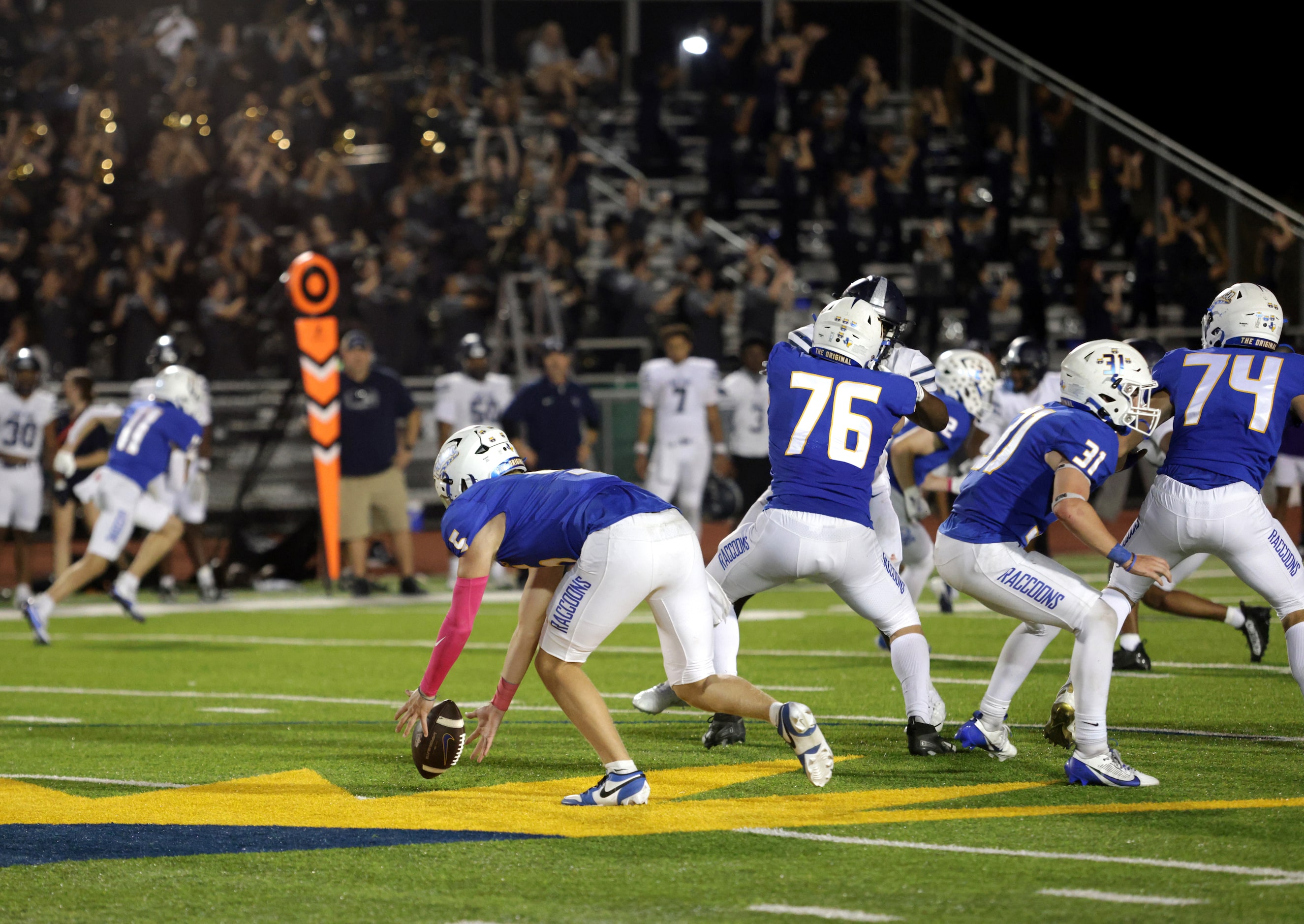 Frisco player #5 Cobyn Harbert recovers the ball after a bad snap during the Frisco Lone...