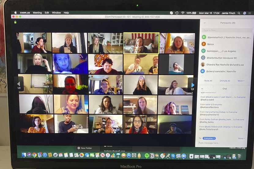People gather on Zoom, a video conferencing app. Companies and friend groups across the U.S....