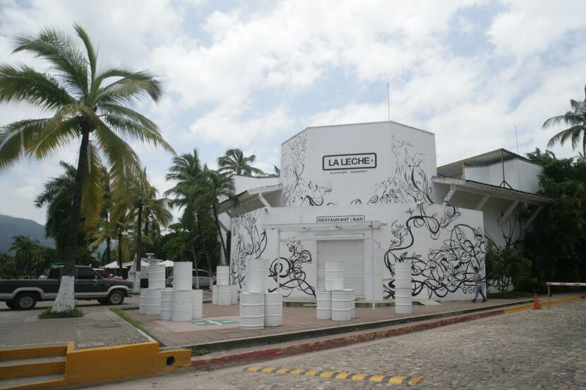 The entrance of La Leche in Puerto Vallarta, Mexico, stands closed after armed men abducted...