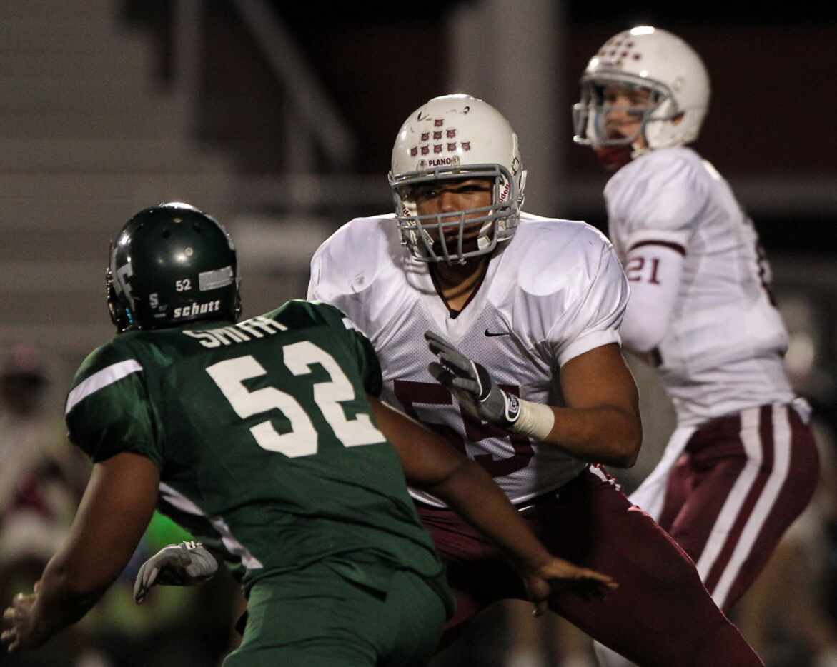 Plano offensive lineman Joseph Noteboom (55) blocks Naaman Forest linebacker Brandon Smith...