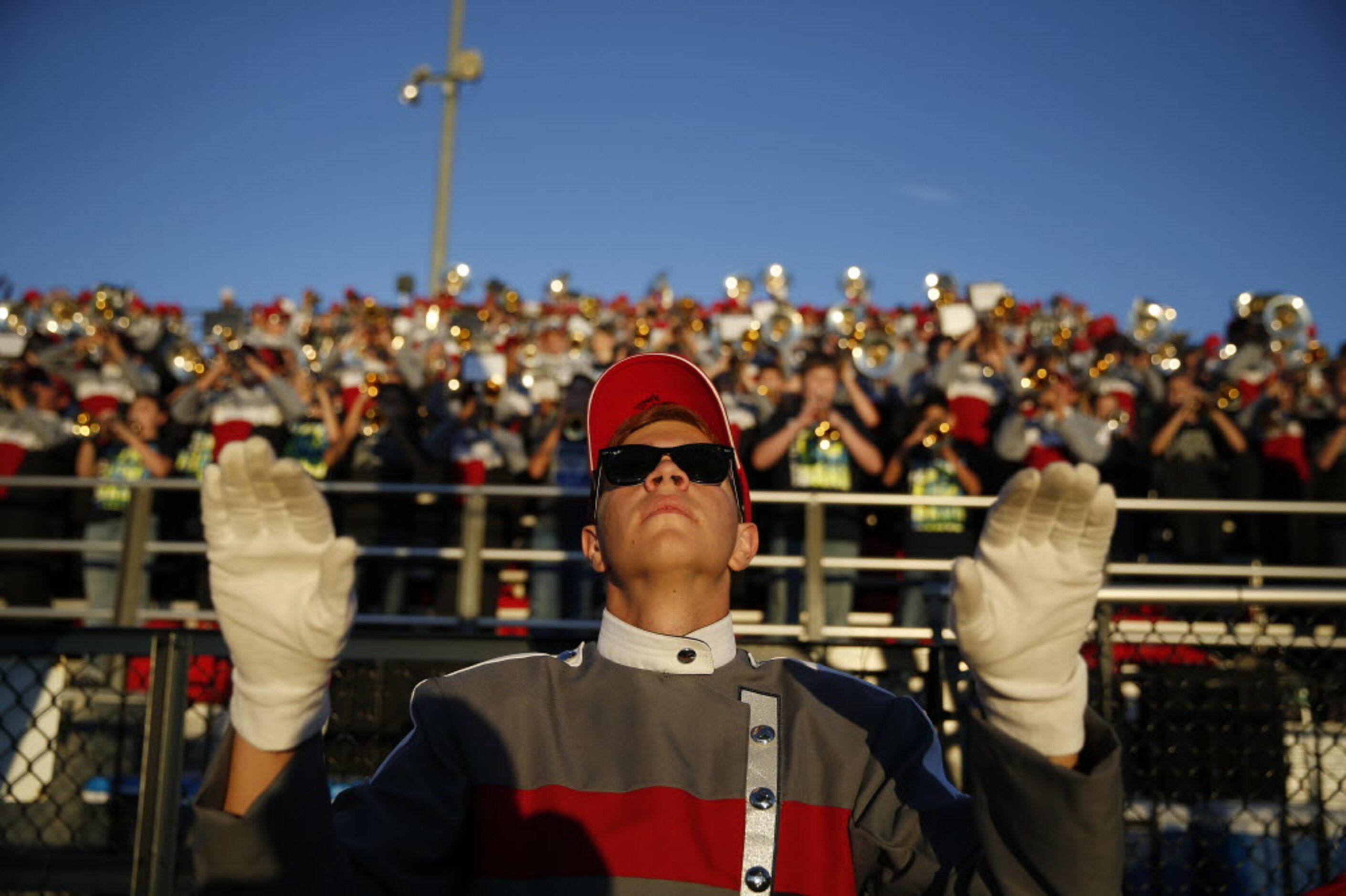 McKinney Boyd band member Camran Ahmed, senior, practices with his band before a high school...