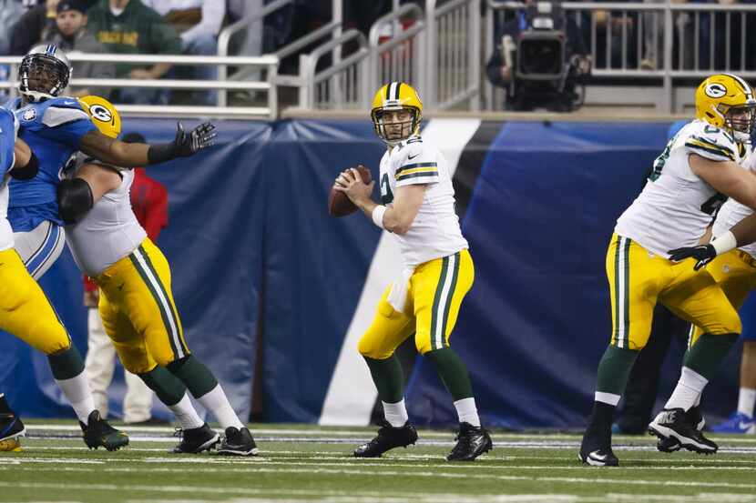 Green Bay Packers quarterback Aaron Rodgers (12) passes against the Detroit Lions during an...