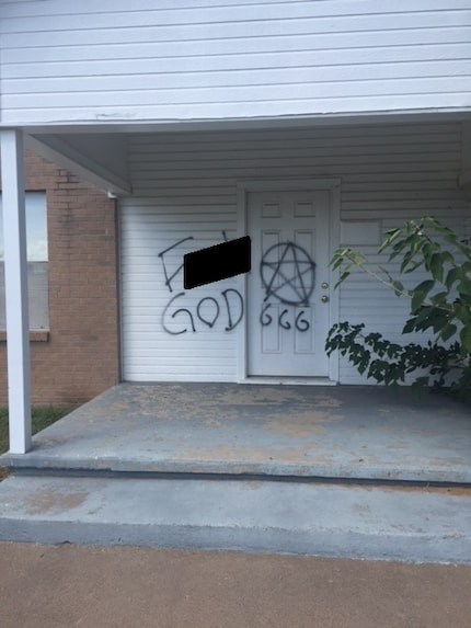 Graffiti on the Friendship Baptist Church in Springtown.