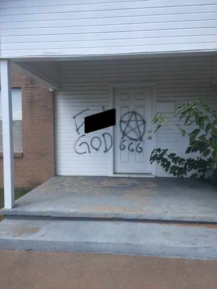Graffiti on the Friendship Baptist Church in Springtown.