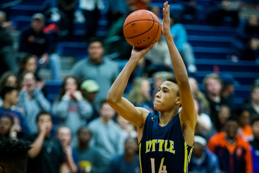 Little Elm guard R.J. Hampton (14) shoots a free throw during a high school basketball game...