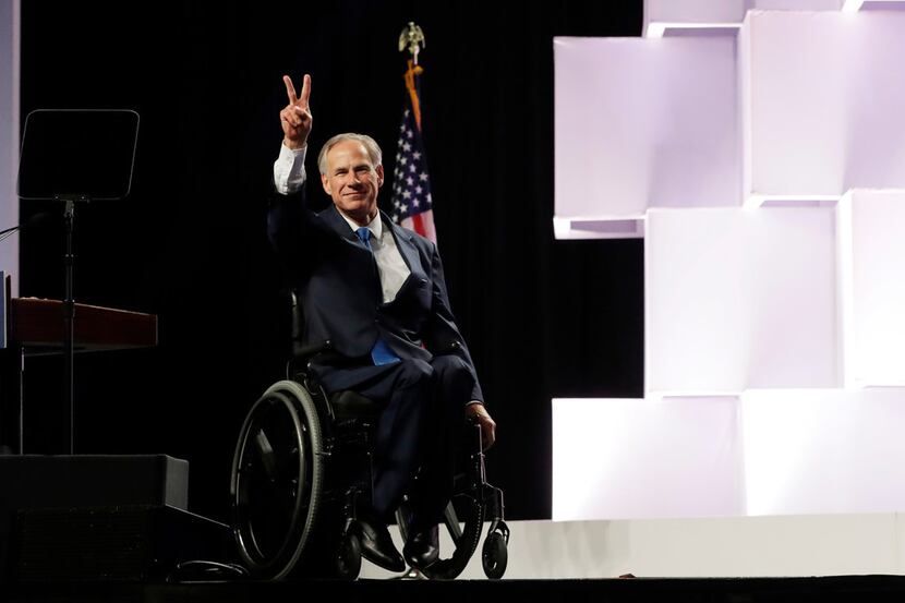 Gov. Greg Abbott, shown at the Republican Party of Texas convention in San Antonio in June,...