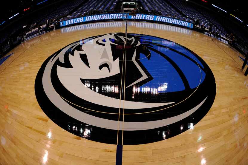 Feb 13, 2013; Dallas, TX, USA; A general view of the Dallas Mavericks logo at center court...