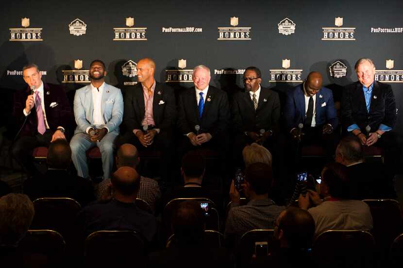 Dallas Cowboys owner Jerry Jones smiles (center) during a press conference with Pro Football...