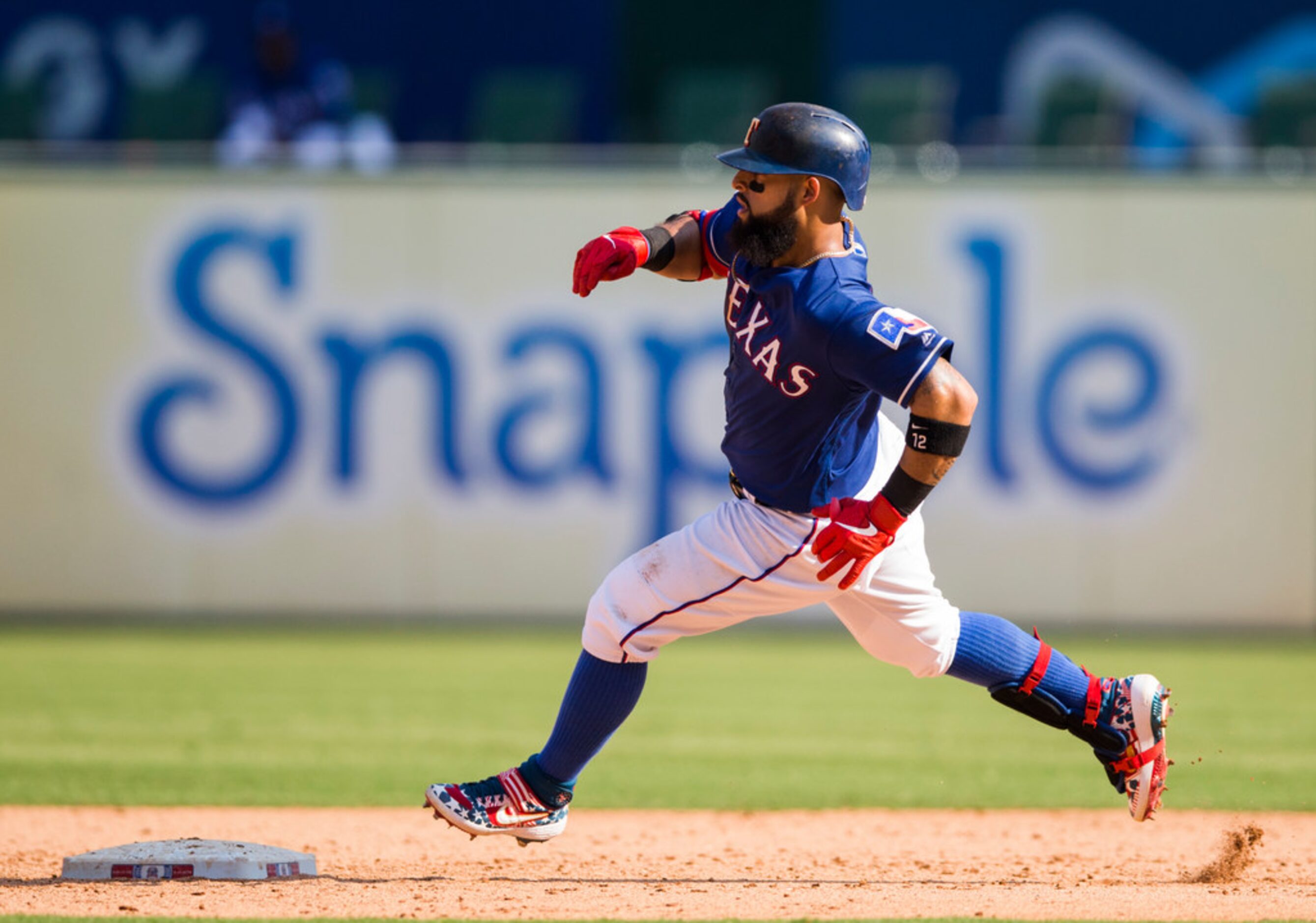 Texas Rangers second baseman Rougned Odor (12) runs to second base after a hit during the...