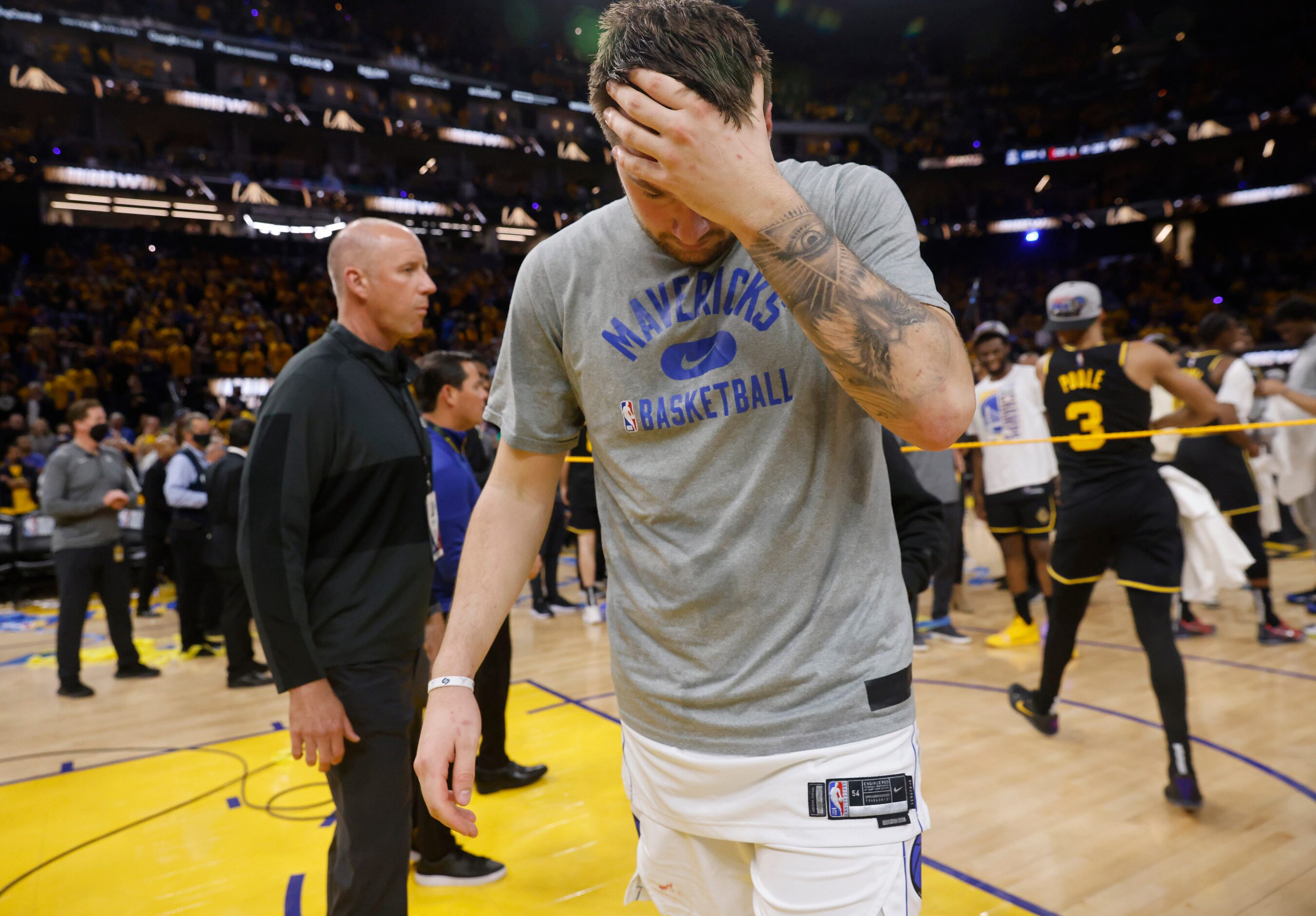 Dallas Mavericks guard Luka Doncic (77) walks off the court following their series loss to...