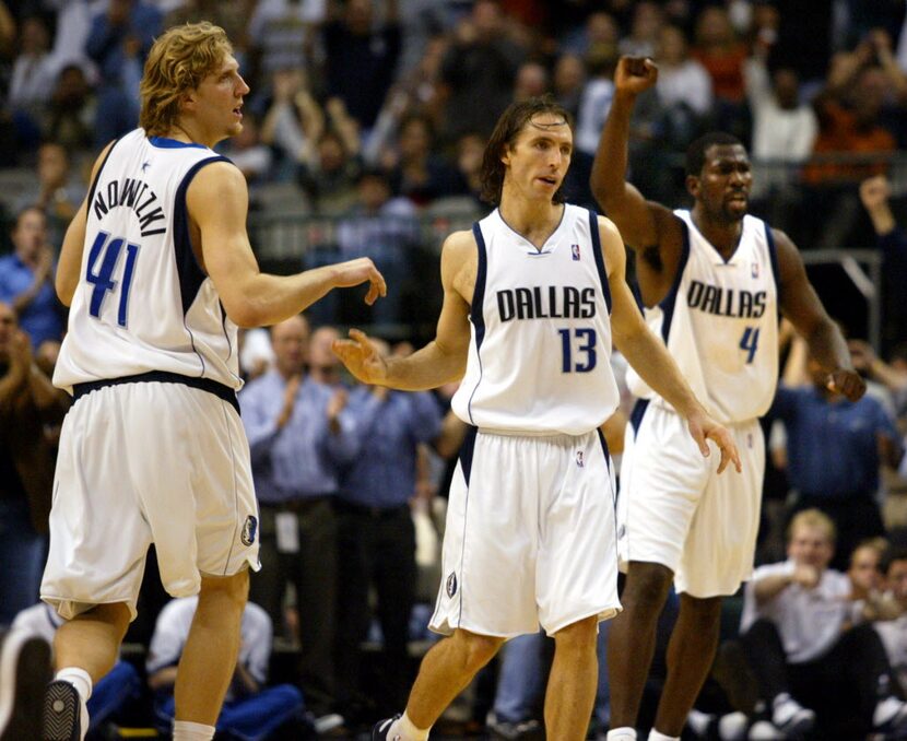 Dirk Nowitzki, left, Steve Nash, center, and Michael Finley, right, helped the Mavericks to...