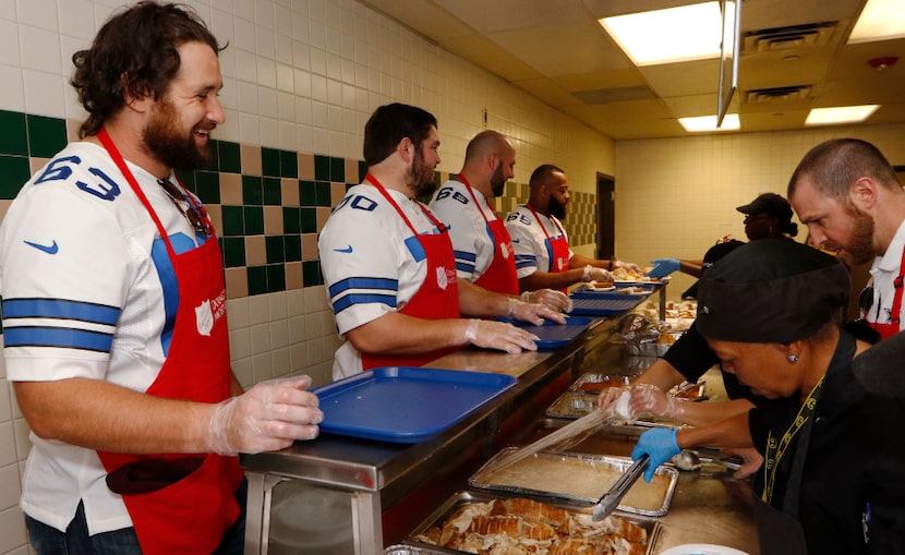 Dallas Cowboys tackle, Emmett Cleary, from left, Zack Martin, guard, Doug Free, tackle, and...