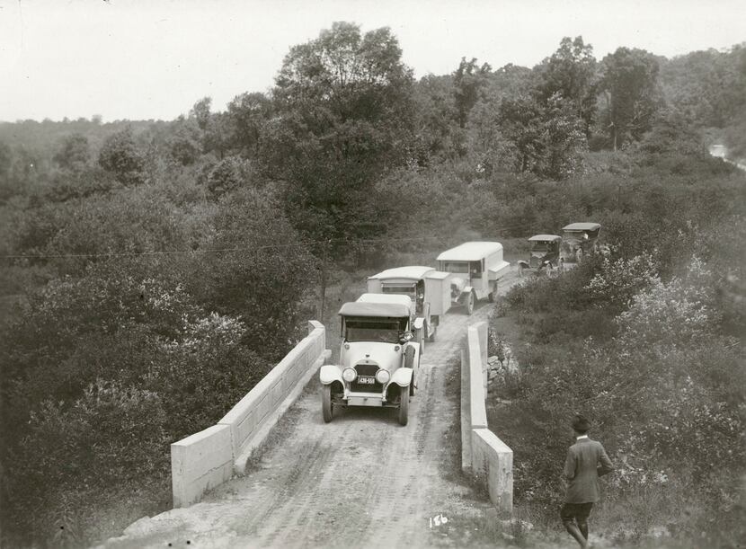 The caravan crosses a bridge while carrying Henry Ford, Thomas Edison and others on one of...