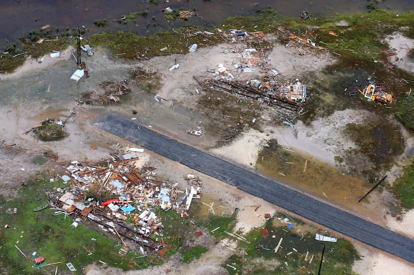 This aerial photo shows a view of damage in the wake of Hurricane Harvey, Monday, Aug. 28,...