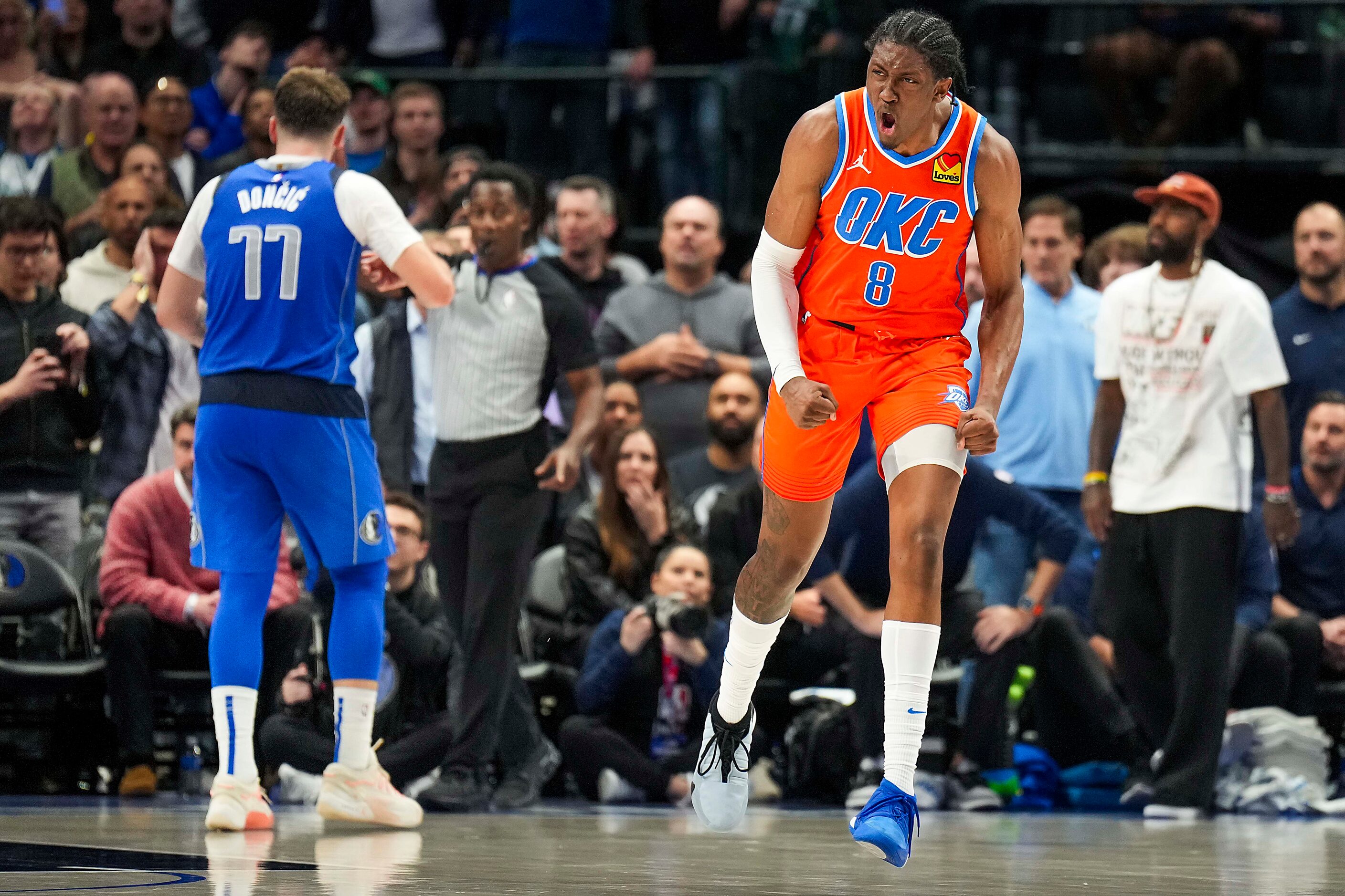 Oklahoma City Thunder forward Jalen Williams (8) celebrates after scoring to put the Thunder...