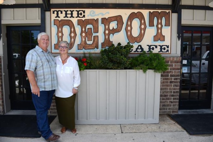 
Dennis Francis, owner of The Depot Cafe, and his wife, Deborah Francis, stand outside the...