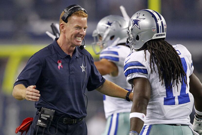Dallas Cowboys wide receiver Dwayne Harris (17) receives a warm welcome on the sideline from...