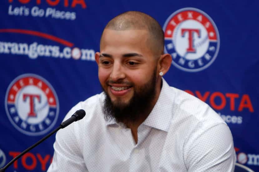 Texas Rangers second baseman Rougned Odor speaks during a press conference at Globe Life...