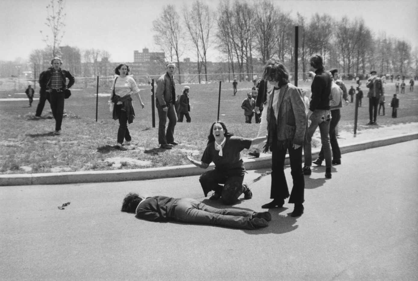 Mary Ann Vecchio kneels over the body of fellow student Jeffrey Miller, who was killed by...