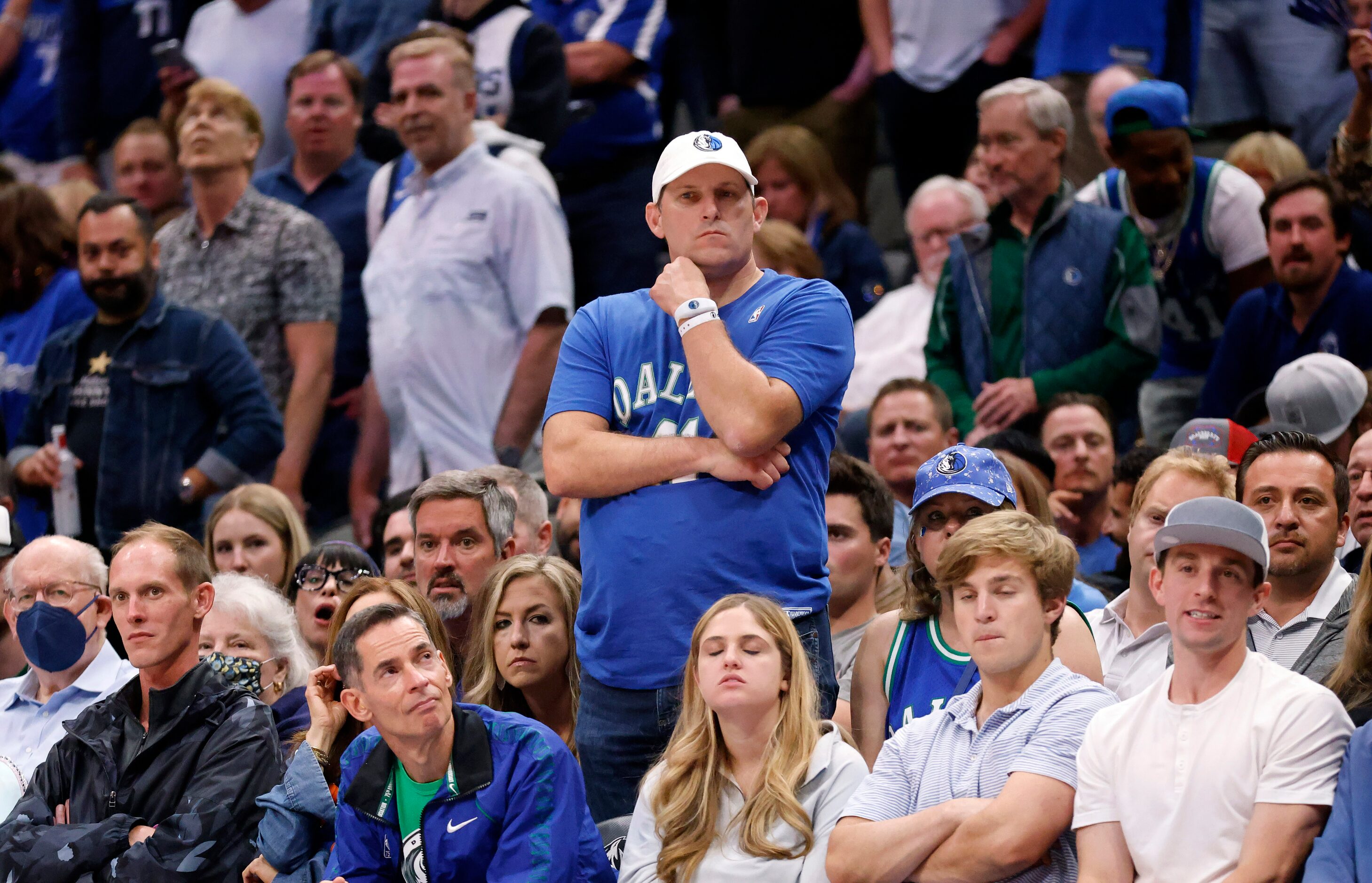 Dallas Mavericks fans react to the teams losing effort in the fourth quarter in Game 3 of...