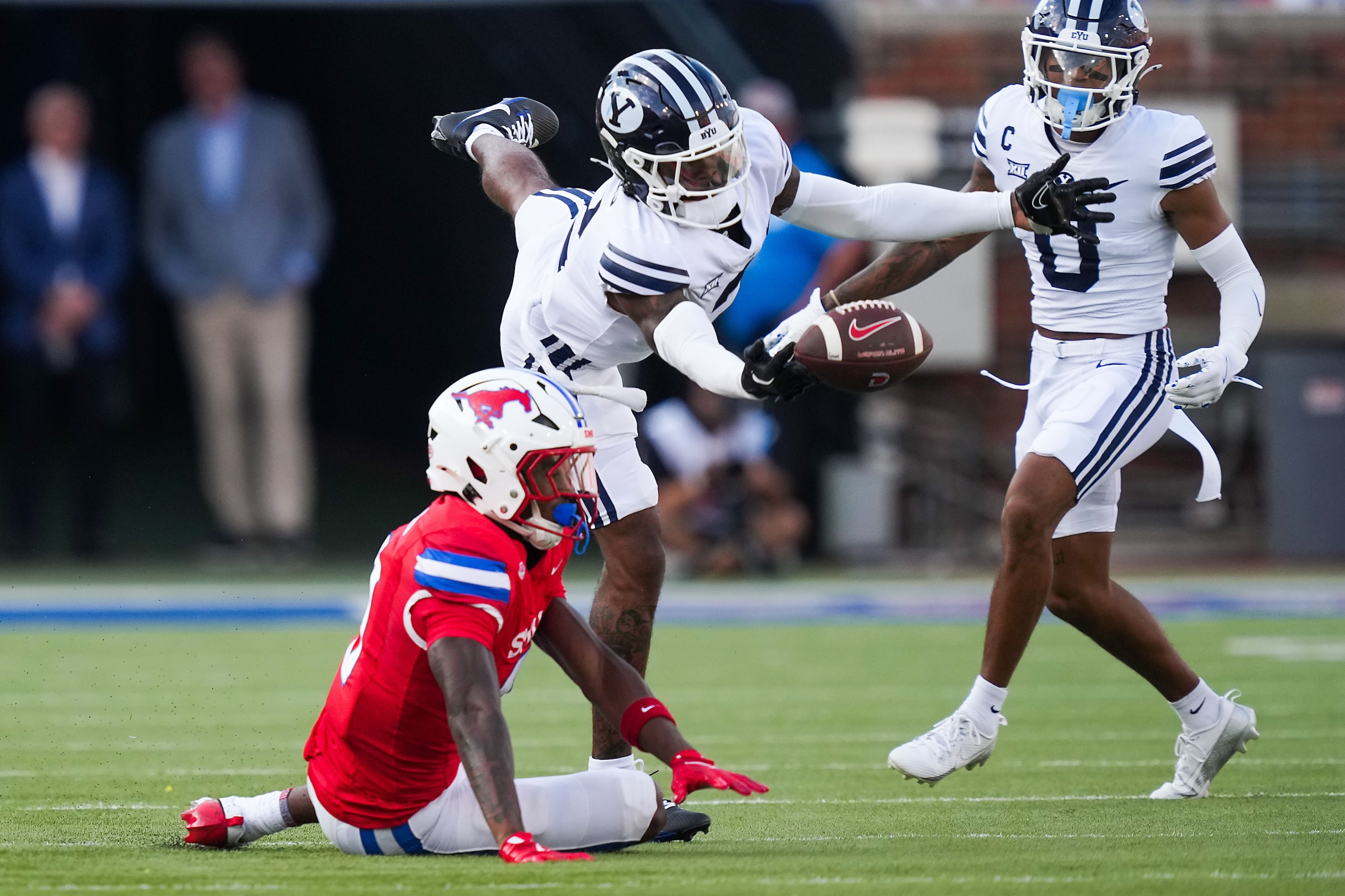 BYU cornerback Marque Collins (4) breaks up a pass intended for SMU wide receiver Key'Shawn...