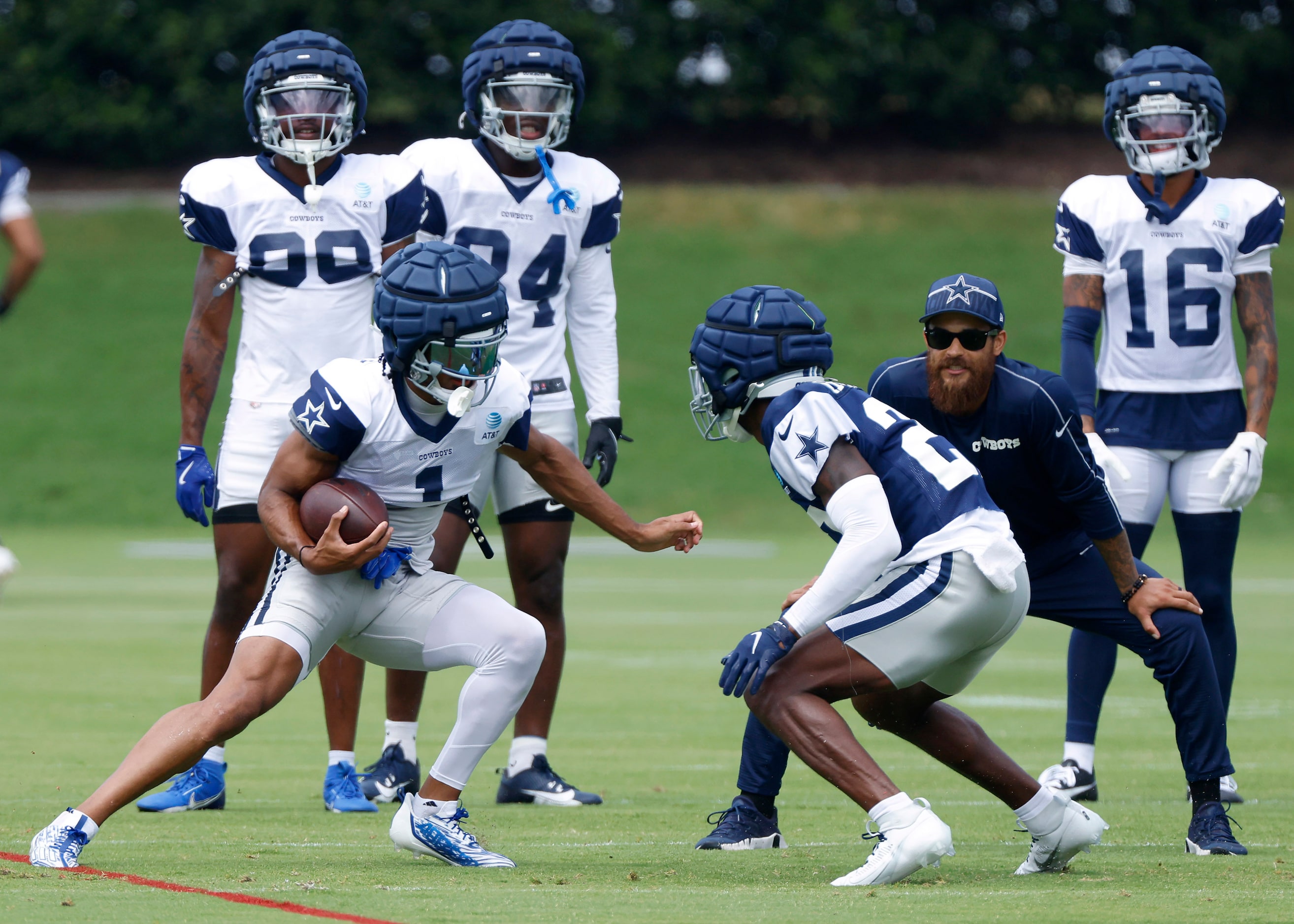 Dallas Cowboys wide receiver Jalen Tolbert (1) makes a cut after catching pass while being...