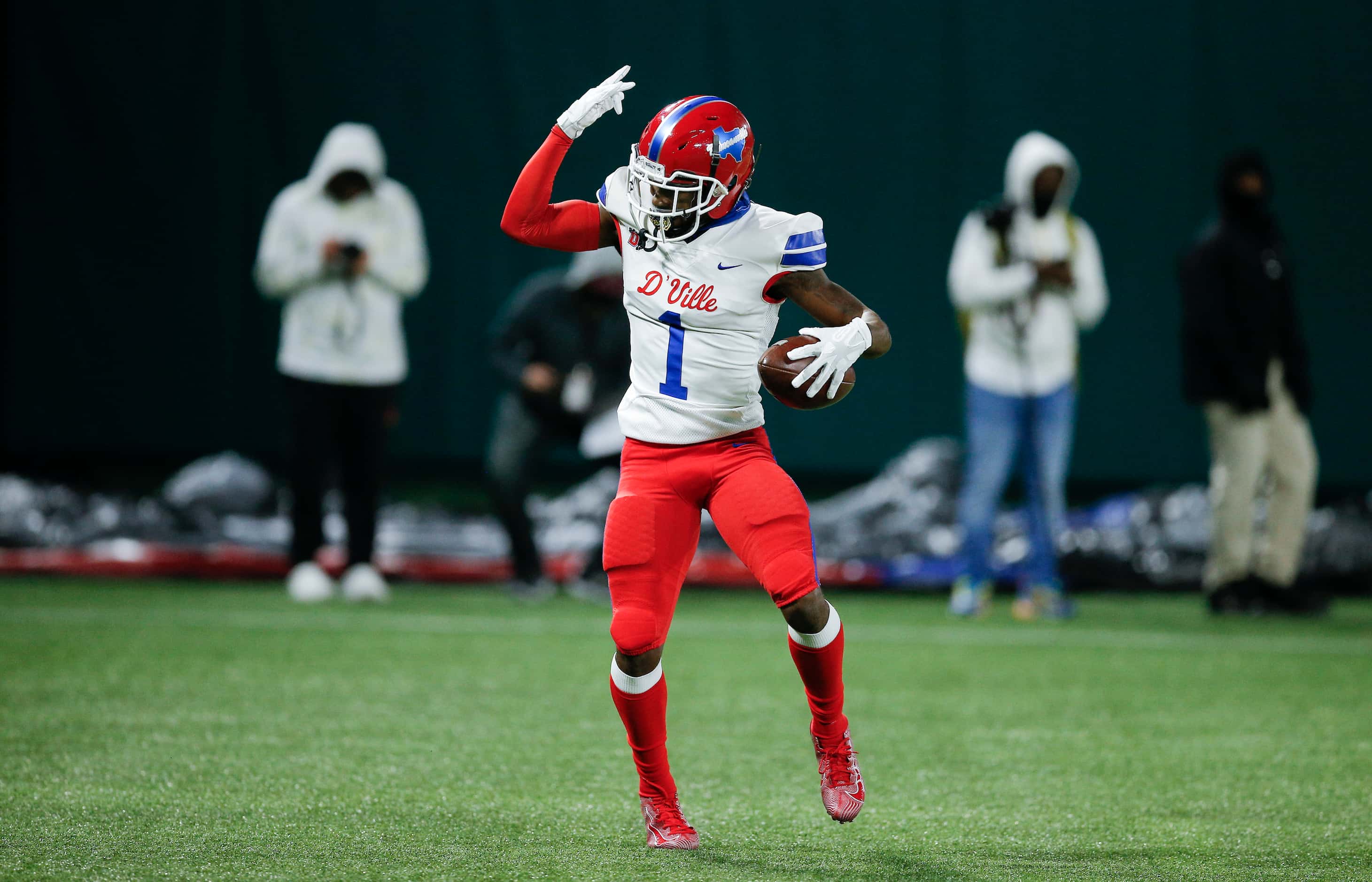 Duncanville senior running back Chris Hicks celebrates a touchdown during the first half of...