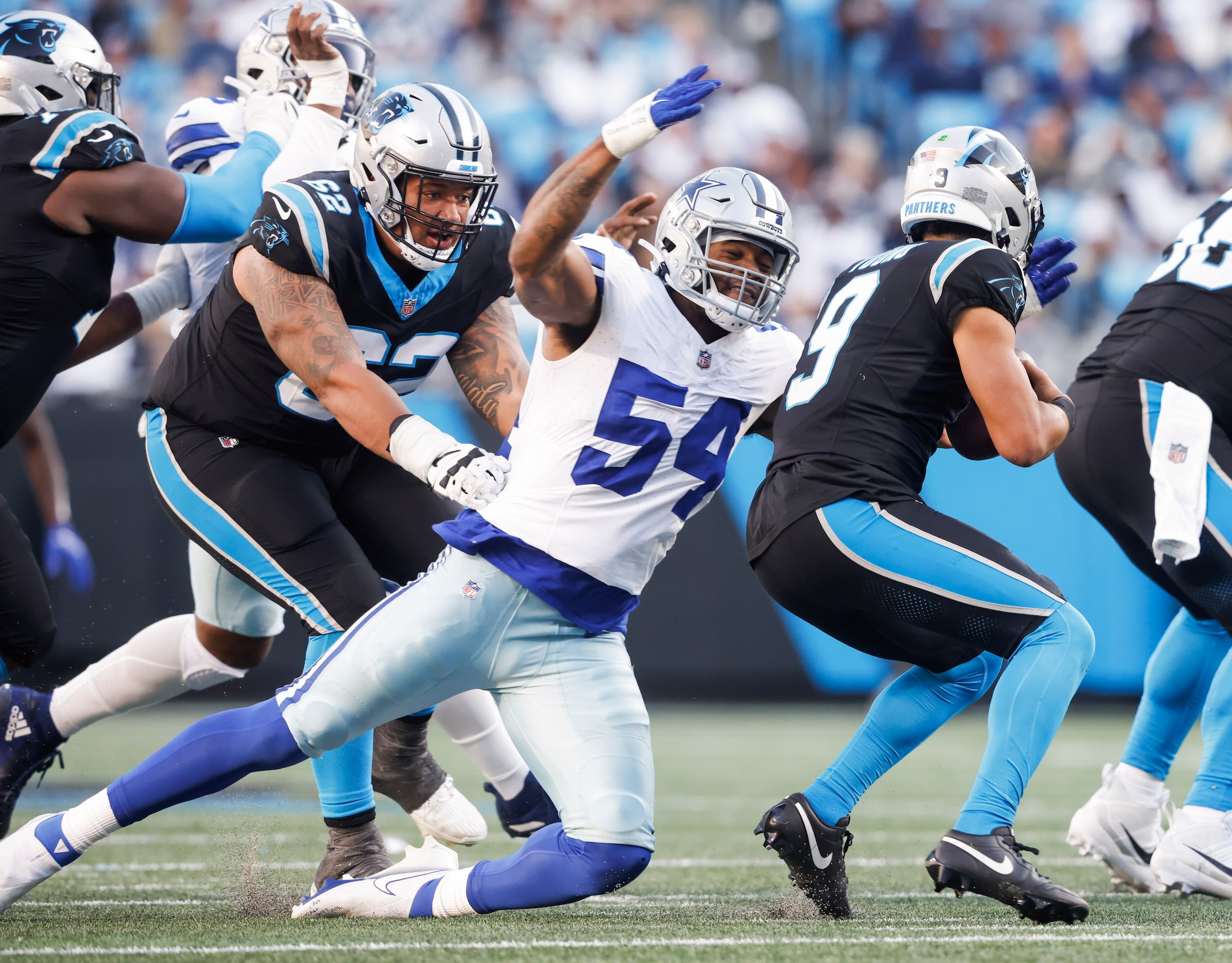 Dallas Cowboys defensive end Sam Williams (54) sacks Carolina Panthers quarterback Bryce...