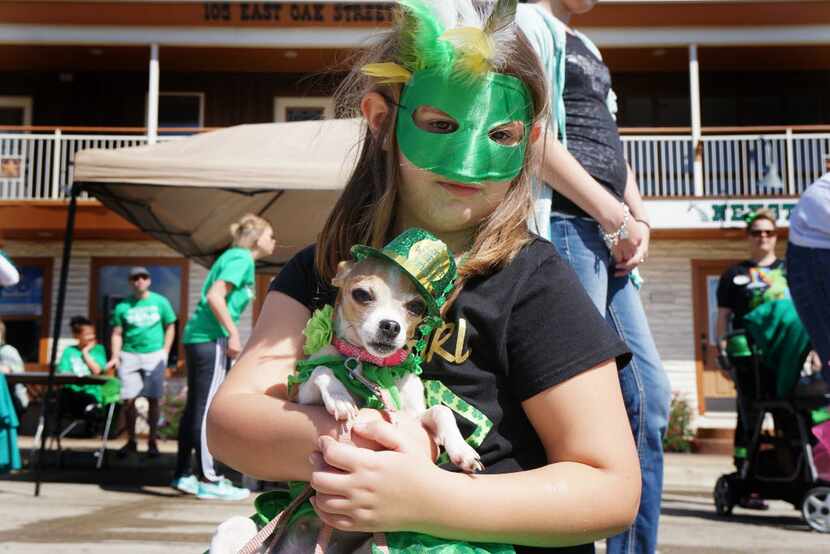 Leonia Hopper and her dog Rally attended the St. Paddy's Pickle Pet Parade in Mansfield in...
