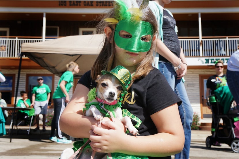 Leonia Hopper and her dog Rally attended the St. Paddy's Pickle Pet Parade in Mansfield in...