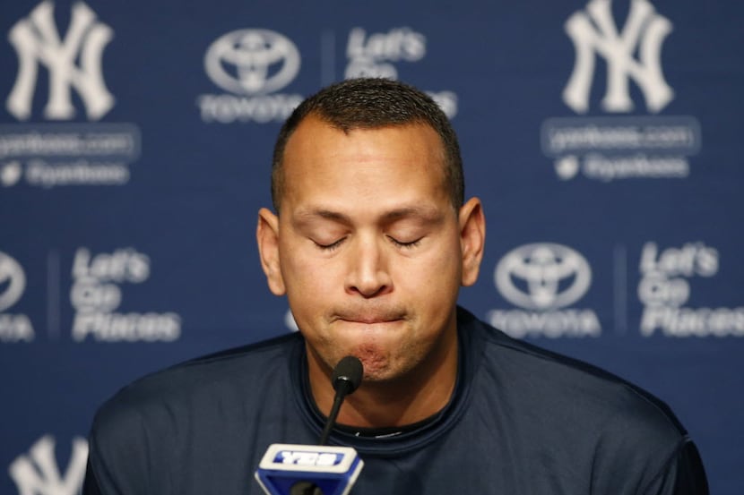 New York Yankees designated hitter Alex Rodriguez pauses during a news conference, Sunday,...