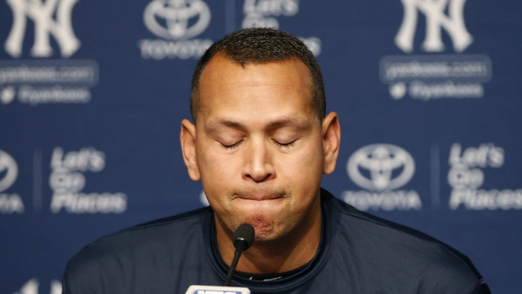 New York Yankees designated hitter Alex Rodriguez pauses during a news conference, Sunday,...