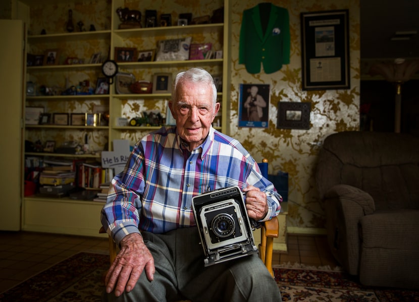 Sports photographer Brad Bradley poses for a portrait with his 4x5 Super Speed Graphic...