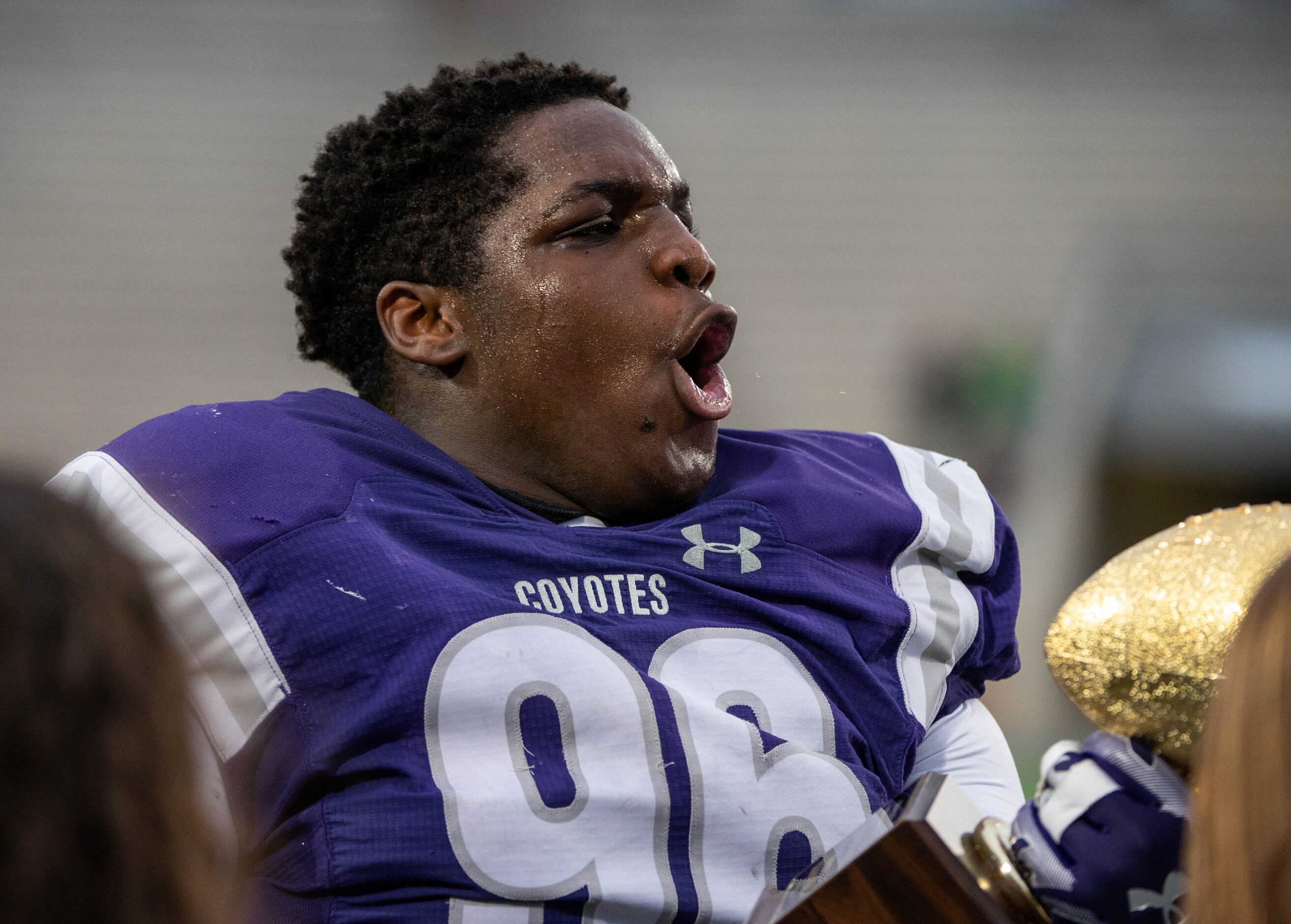 Anna’s Cobie Miller (96) celebrates with the trophy after their 27-24 win of a Class 4A...