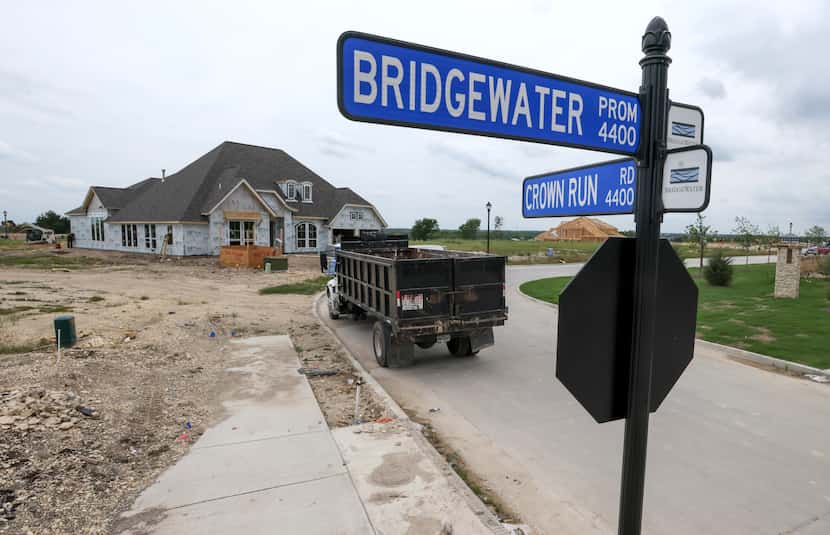 Construction continues on a portion of BridgeWater, a master-planned community that spans...