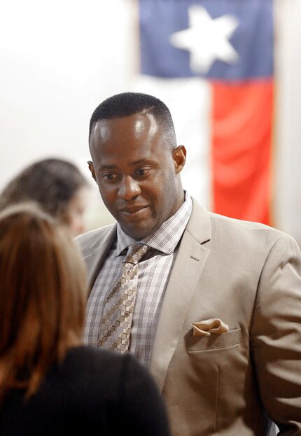 Former Mesquite police officer Derick Wiley visits with people during a lunch break in his...