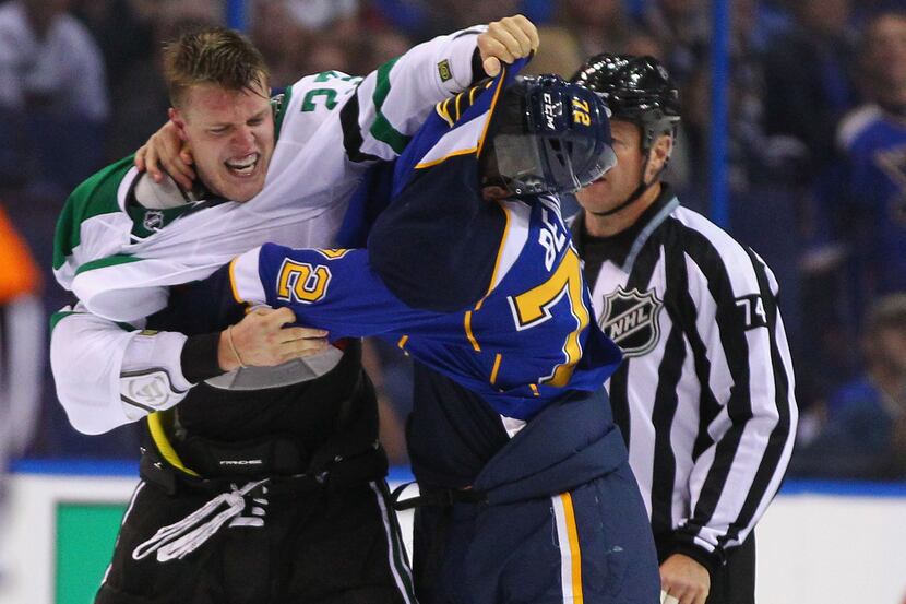 ST. LOUIS, MO - SEPTEMBER 21: Kevin Connauton #23 of the Dallas Stars fights Cody Beach #72...