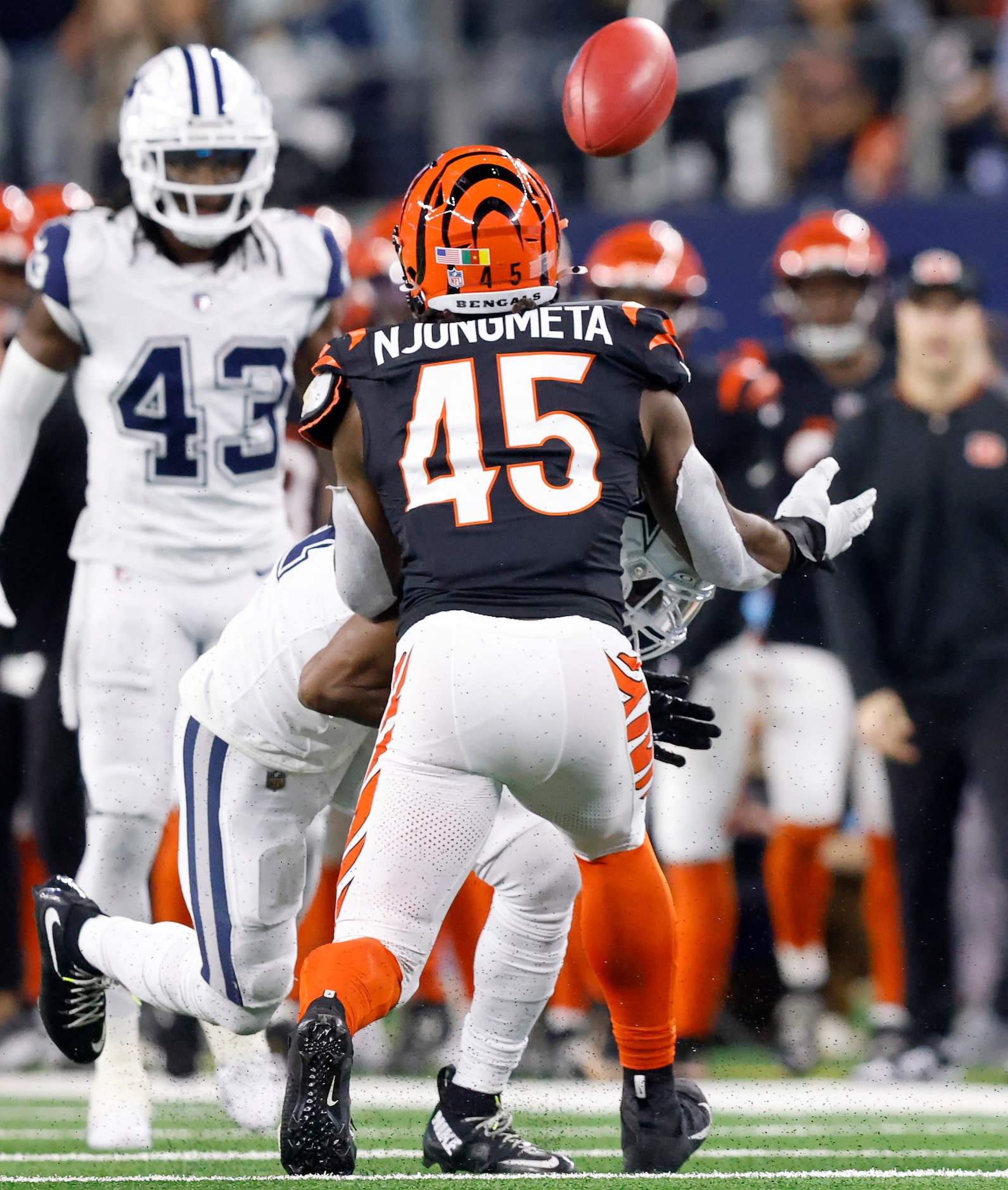 Dallas Cowboys cornerback Amani Oruwariye (27) muffs a blocked punt as Cincinnati Bengals...