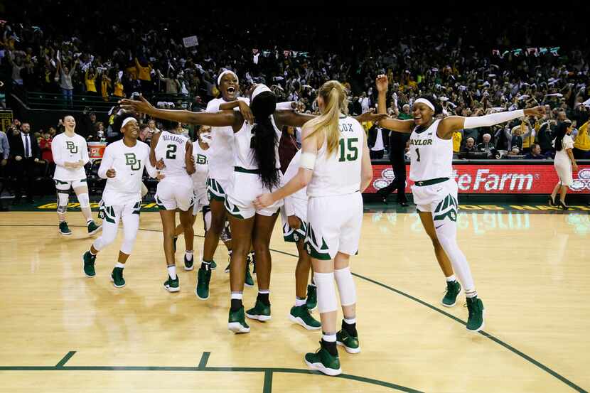 Baylor players celebrate after a 68-57 victory over No. 1 Connecticut in an NCAA college...