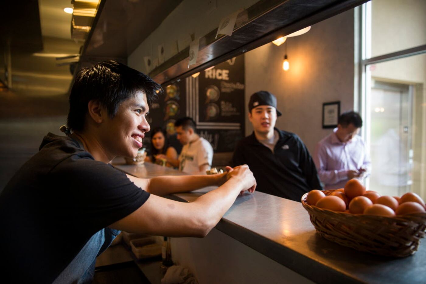 Executive Chef Matthew Hoa chats with customers at Ten.
